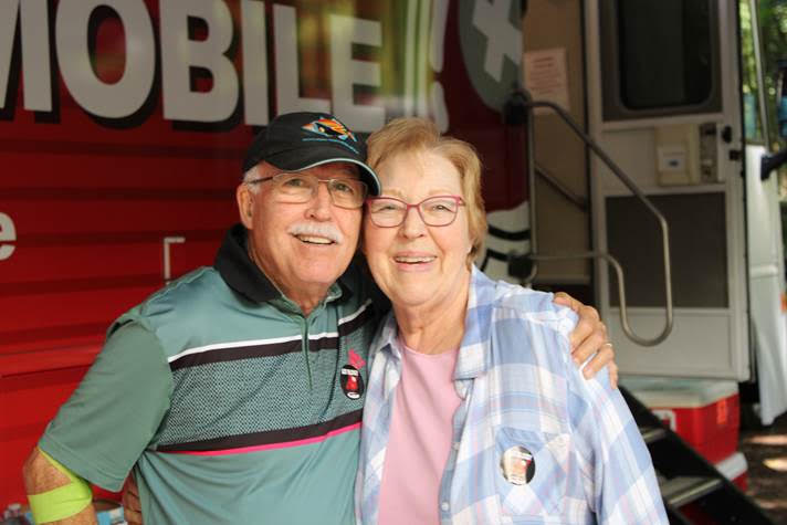 Donors giving on board the Bloodmobile
